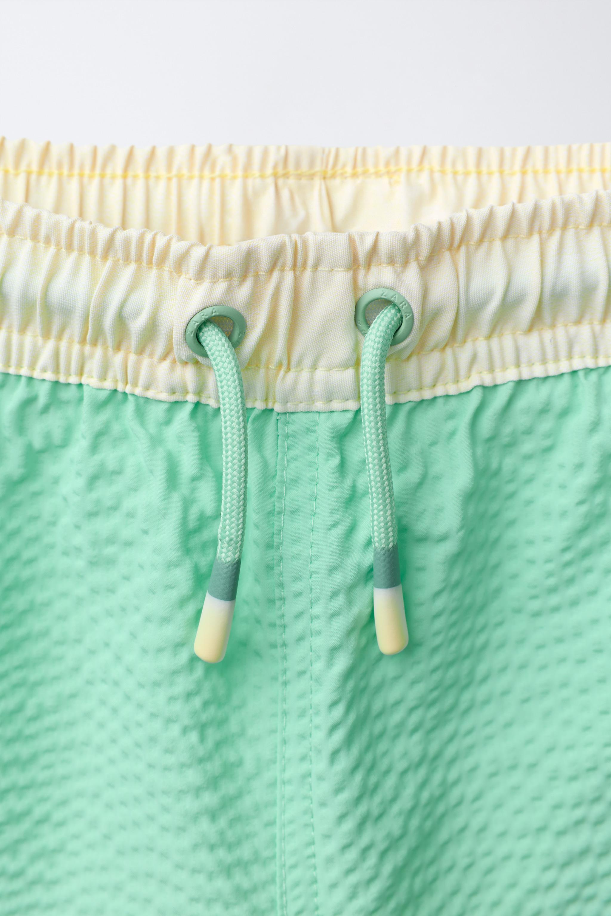 6-14 YEARS / LABEL SWIM SHORTS